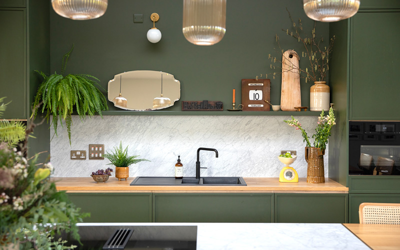 Sink area with marble splashback